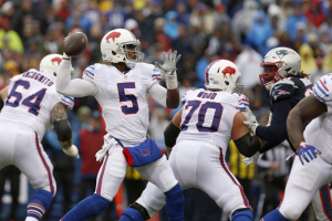 Buffalo Bills quarterback Tyrod Taylor (5) throws a pass during the first half against the New England Patriots at New Era Field.  <br/>Mandatory Credit: Timothy T. Ludwig-USA TODAY Sports