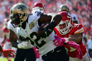 New Orleans Saints running back Mark Ingram (22) carries the ball as Kansas City Chiefs outside linebacker Frank Zombo (51) defends during the first half at Arrowhead Stadium.  <br/>Mandatory Credit: Jeff Curry-USA TODAY Sports