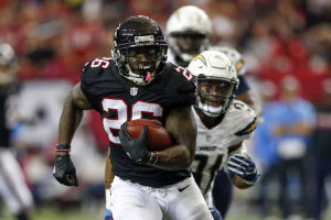 Atlanta Falcons running back Tevin Coleman (26) runs the ball for a touchdown against the San Diego Chargers in the second quarter at the Georgia Dome. <br />
 <br/>Brett Davis-USA TODAY Sports