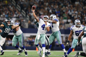 Dallas Cowboys quarterback Dak Prescott (4) throws a touchdown pass in the fourth quarter against the Philadelphia Eagles at AT&T Stadium.  <br/>Mandatory Credit: Matthew Emmons-USA TODAY Sports