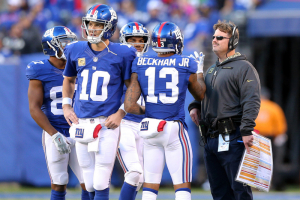 New York Giants head coach Ben McAdoo talks with Giants wide receiver Sterling Shepard (87) and quarterback Eli Manning (10) and wide receiver Roger Lewis (82) and wide receiver Odell Beckham Jr. (13) during a review during the fourth quarter against the Philadelphia Eagles at MetLife Stadium.  <br/>Mandatory Credit: Brad Penner-USA TODAY Sports