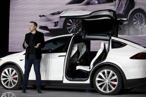 Tesla Motors CEO Elon Musk introduces the falcon wing door on the Model X electric sports-utility vehicles during a presentation in Fremont, California, U.S. September 29, 2015. REUTERS/Stephen Lam/Files <br/>