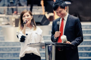 Kong Hee and wife Sun Ho at City Harvest Church, Singapore <br/>Facebook/Kong Hee