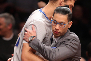 Brooklyn Nets point guard Jeremy Lin (7) hugs Brooklyn Nets center Brook Lopez (11) before a game against the Minnesota Timberwolves at Barclays Center.  <br/>Mandatory Credit: Brad Penner-USA TODAY Sports