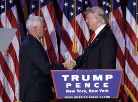 Donald Trump greets his running mate Mike Pence during his election night rally in Manhattan. REUTERS/Mike Segar <br/>