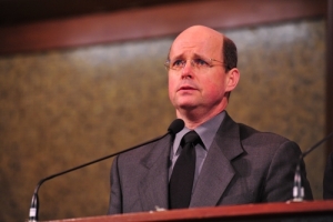 Despite his outward expression of sorrow, Rev. Jamie Taylor (James Hudson Taylor IV) speaks to the Chinese believers with faith and gratitude during his father’s memorial service held at the Hong Kong Kowloon City Baptist Church on April 4, 2009. <br/>Medical Services International 