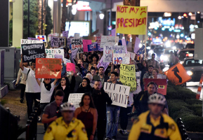 Demonstrators march along the Las Vegas Strip in protest against the election of Republican Donald Trump as President of the United States, in Las Vegas, Nevada, U.S. November 12, 2016. <br/>REUTERS/David Becker