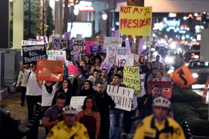 Demonstrators march along the Las Vegas Strip in protest against the election of Republican Donald Trump as President of the United States, in Las Vegas, Nevada, U.S. November 12, 2016. <br/>REUTERS/David Becker