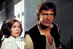 Carrie Fisher as Princess Leia Organa and Harrison Ford as Han Solo in the original 1977 