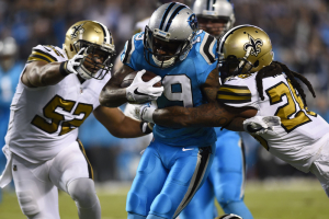 Carolina Panthers wide receiver Ted Ginn (19) with the ball as New Orleans Saints outside linebacker Craig Robertson (52) and cornerback B.W. Webb (28) defend in the first quarter at Bank of America Stadium.  <br/>Bob Donnan-USA TODAY Sports