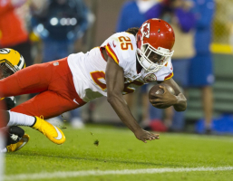 Kansas City Chiefs running back Jamaal Charles (25) dives for a touchdown during the first quarter against the Green Bay Packers at Lambeau Field.  <br/>Jeff Hanisch-USA TODAY Sports