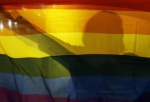 Gay Rights Activist Holding LGBT Flag