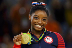 Simone Biles, the most successful woman gymnast in American history, opens up about her life, faith and struggles in her book. <br/>Reuters