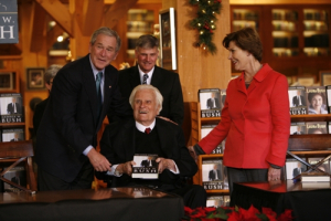 Billy Graham, 92, receives a signed copy of President George W. Bush's memoir Decision Points at the Billy Graham Library in Charlotte, N.C., on Monday, Dec. 20, 2010. <br/>Courtesy of Billy Graham Evangelistic Association