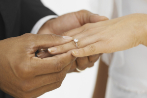 A Pew Research Center poll released in February 2012 found that in 2010, 15 percent of all new marriages in the U.S. were between spouses of different races or ethnicities. <br/>Stock Photo