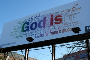 A ''God is'' billboard, sponsored by Times Square Church in New York City, is seen near the Lincoln Tunnel. The ad replaces an atheist ad that declared Christmas is a ''myth.'' <br/>Times Square Church
