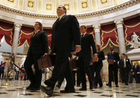 Congressional staff carry ballot boxes to the House chamber for a joint session of Congress held to certify the electoral college ballots.  <br/>Reuters/Kevin Lamarque