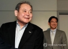 Samsung Founder and Chairman Lee Kun-hee (foreground) with son Lee Jae-yong. 
