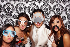 Photo booths are popular set-ups in parties.  <br/>Lace Bridal. 