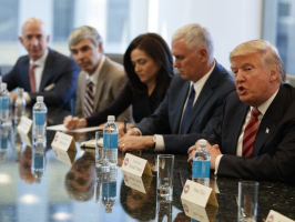 President-elect Donald Trump speaks during a meeting with technology industry leaders at Trump Tower in New York, Wednesday, Dec. 14, 2016. From left are, Amazon founder Jeff Bezos, Alphabet CEO Larry Page, Facebook COO Sheryl Sandberg, Vice President-elect Mike Pence, and Trump.<br />
 <br/>(Photo: Evan Vucci, AP)