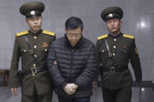 Hyeon Soo Lim, who pastors the Light Korean Presbyterian Church in Toronto, is escorted to his sentencing in Pyongyang, North Korea, on Dec. 16, 2015.  <br/>THE CANADIAN PRESS/AP/Jon Chol Jin