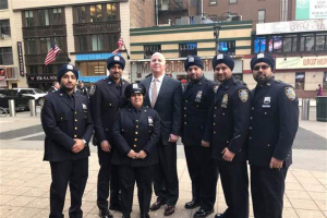 Members of the Sikh Officers Association pose with NYPD Commissioner James O'Neil (middle), after he announced a new rule change that allows New York police officers for religious reasons to wear turbans in place of traditional police caps, and to have beards up to an inch away from their faces.  <br/>Sikh Officers Association