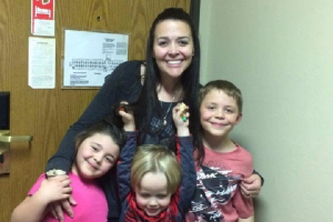 Amy Rickel and her three kids <br/>GoFundMe