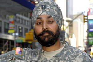 New U.S. military guidelines opened the way for service members to routinely wear religious clothing, such as turbans or skullcaps, while on duty, the Department of Defense announced this week. (Shown here) Afghanistan veteran Kamaljeet Singh Kalsi was granted a religious accommodation by the Army in 2009.  <br/>dnaindia