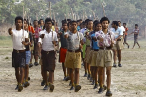 Volunteers of the Hindu nationalist organisation Rashtriya Swayamsevak Sangh (RSS) hold sticks as they march during a training session at Tatiberia village in West Bengal, India, in this May 20, 2015 file photo.  <br/>Reuters/Rupak De Chowdhuri