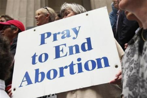 A pro-life supporter holds up a sign during a rally in New York March 23, 2012. <br />
<br />
 <br/>Reuters/Shannon Stapleton 