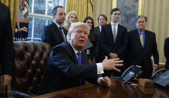 President Donald Trump talks with reporters in the Oval Office of the White House in Washington, Tuesday, Jan. 24, 2017, before signing an executive order on the Keystone XL pipeline. <br/>AP Photo/Evan Vucci