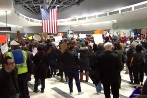 Protesters are flooding the Philadelphia International Airport on Sunday (Jan. 29, 2017) after two Christian families from Syria were turned away Saturday due to President Donald Trump's new immigration policy and ban from seven, certain countries, including Syria. The two families reportedly were working since 2003 to come to the United States, and their U.S. relatives said they had paid for and had earned their visas. <br/>Fox 29