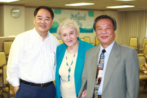 (Left) ORTV Executive Director Simon Hung and (center) Dr. Doris Brougham. <br/>