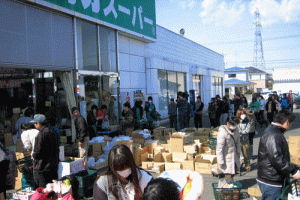 Customers lining up for food at a grocery store on Tuesday, March 15, 2011, four days after an 8.9-magnitude earthquake struck Japan. <br/>Phillip Foxwell