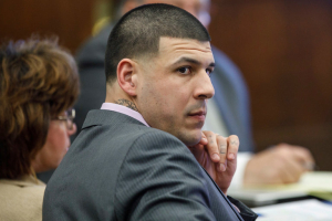 Former New England Patriots tight end Aaron Hernandez in March at his trial in the killings of two men in Boston. On Wednesday, five days after being acquitted in that case, he was found hanged in his prison cell.  <br/>Pool photo by Pat Greenhouse