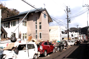 Picture shows cars mangled in front of the United Church of Christ in the city of Kamaishi in Iwate Prefecture. <br/>Hokkaido Christian Mission Network