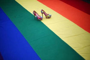 High heel shoes are seen on a rainbow flag during a protest by the LGBT community against violence against transgender people outside Metropolitan Cathedral in Mexico City, Mexico. <br/>Reuters 