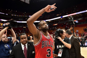Chicago Bulls guard Dwyane Wade (No. 3) waves to the fans after defeating the Miami Heat 98-95 at American Airlines Arena in Miami November 10, 2016.  <br/>USA TODAY Sports/Reuters Pic