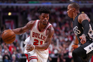 Chicago Bulls forward Jimmy Butler (21) dribbles the ball against Brooklyn Nets guard Randy Foye (2) at the United Center. <br/>Mike DiNovo, USA TODAY Sports/Reuters