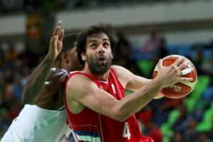 Miloš Teodosić of Serbia drives to the basket during a game against the United States. <br/>Marko Djurica/Reuters