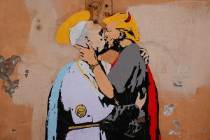 A life-sized mural that shows Pope Francis kissing Donald Trump has appeared on a wall near the Vatican<br />
 <br/>Reuters