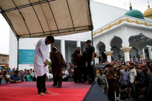 An Indonesian man is publicly caned for having gay sex, in Banda Aceh, Aceh province, Indonesia.  <br/>Reuters/Beawiharta