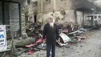 This image made from undated militant video which could not be independently verified shows Father Teresito Suganob.  <br/>Militant Video via AP