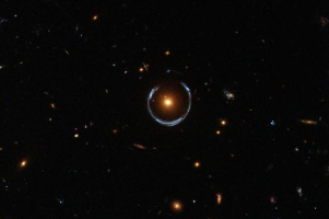 Einstein's general theory of relativity is proven yet again via the Hubble Space Telescope. <br/>NASA, ESA