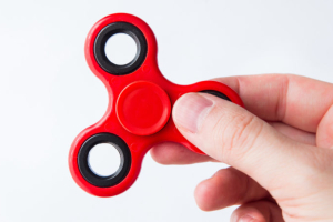 Fidget spinners are marketed as a stress reliever for children and adults who have problems with focus or fidgeting such as those who suffer from ADHD, autism and anxiety. <br/>Shutterstock 