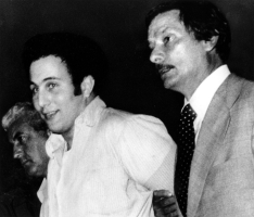David Berkowitz (second from left) in August 1977, after his arrest <br/>AP Photo