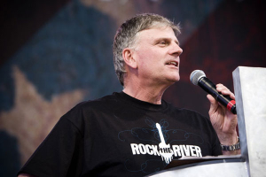 In this file photo, Franklin Graham speaks to crowd of 65,000 youth at the Rock the River Tour stop under the Arch in St. Louis. <br/>Billy Graham Evangelistic Association