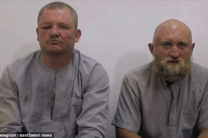 Roman Zabolotny, 39, and Grigory Tsurkanu, 38, were thought to be fighting for a private Russian mercenary force in Syria when they were captured by ISIS last week.  <br/>Telegram/East2West News
