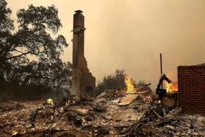  The remains of fire damaged homes after an out of control wildfire moved through. <br/>California wildfires