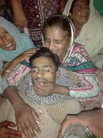 Arsalan Masih’s mother mourns over his body. <br/>Morning Star News courtesy of attorney